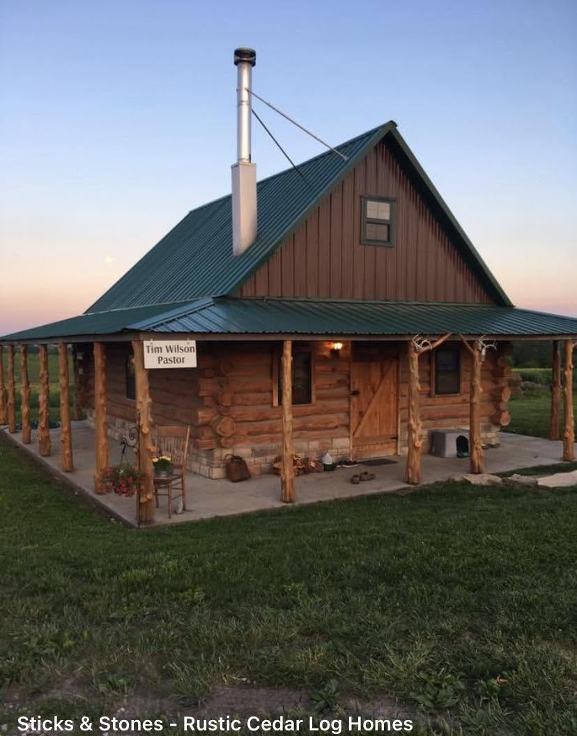 Finished cedar log cabin at dusk