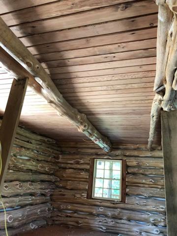 Sticks & Stones hand-notched cedar log cabin work