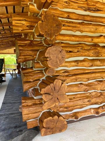 Sticks & Stones hand-notched cedar log cabin work