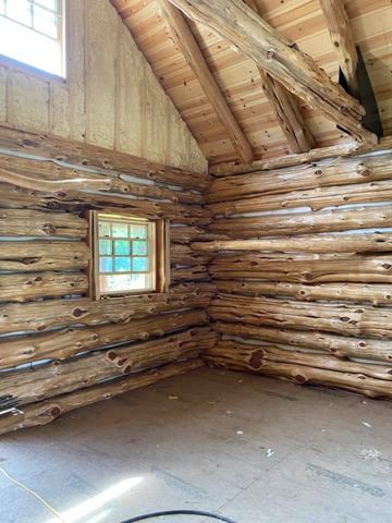 Sticks & Stones hand-notched cedar log cabin work