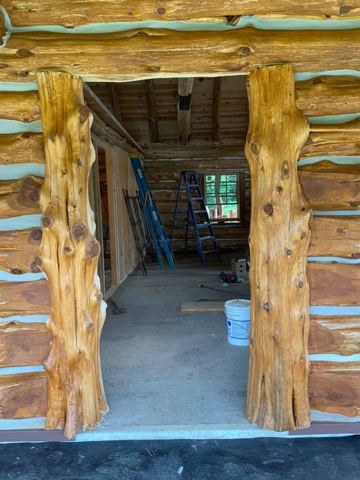 Sticks & Stones hand-notched cedar log cabin work