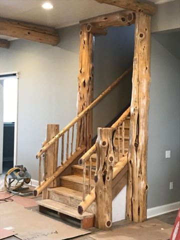 Sticks & Stones hand-notched cedar log cabin work