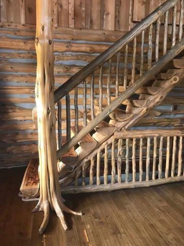 Sticks & Stones hand-notched cedar log cabin work