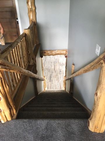 Sticks & Stones hand-notched cedar log cabin work