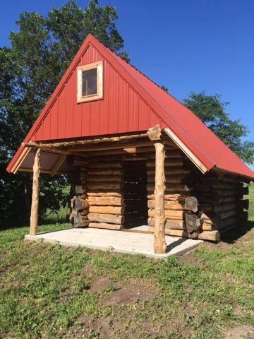 Sticks & Stones hand-notched cedar log cabin work