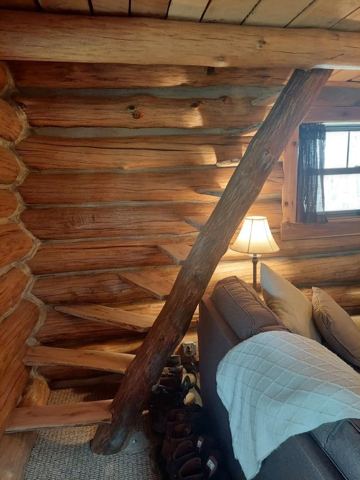 Sticks & Stones hand-notched cedar log cabin work