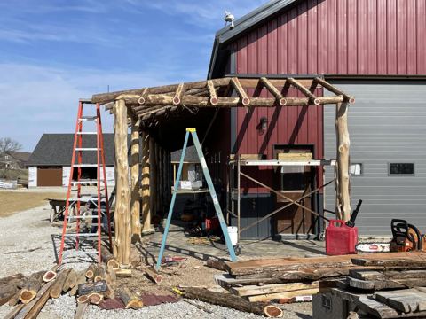 Sticks & Stones hand-notched cedar log cabin work