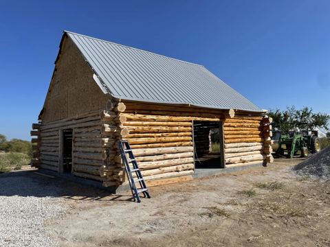 Sticks & Stones hand-notched cedar log cabin work