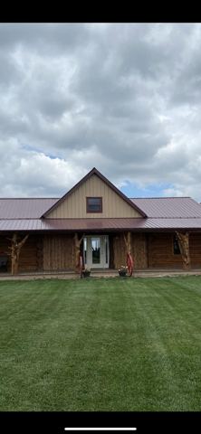 Sticks & Stones hand-notched cedar log cabin work