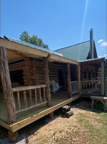 Sticks & Stones hand-notched cedar log cabin work
