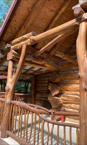 Sticks & Stones hand-notched cedar log cabin work