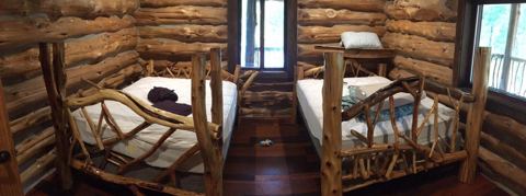 Sticks & Stones hand-notched cedar log cabin work