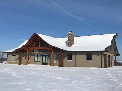 Sticks & Stones hand-notched cedar log cabin work