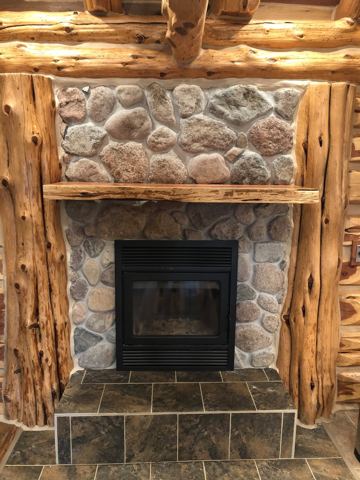 Sticks & Stones hand-notched cedar log cabin work