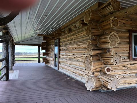 Sticks & Stones hand-notched cedar log cabin work