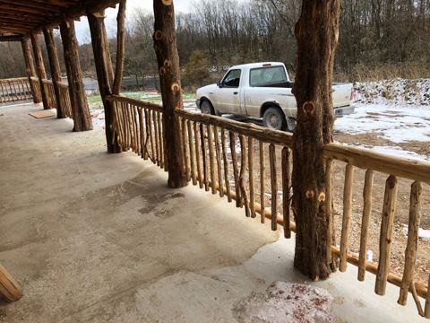 Sticks & Stones hand-notched cedar log cabin work