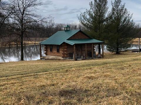 Sticks & Stones hand-notched cedar log cabin work